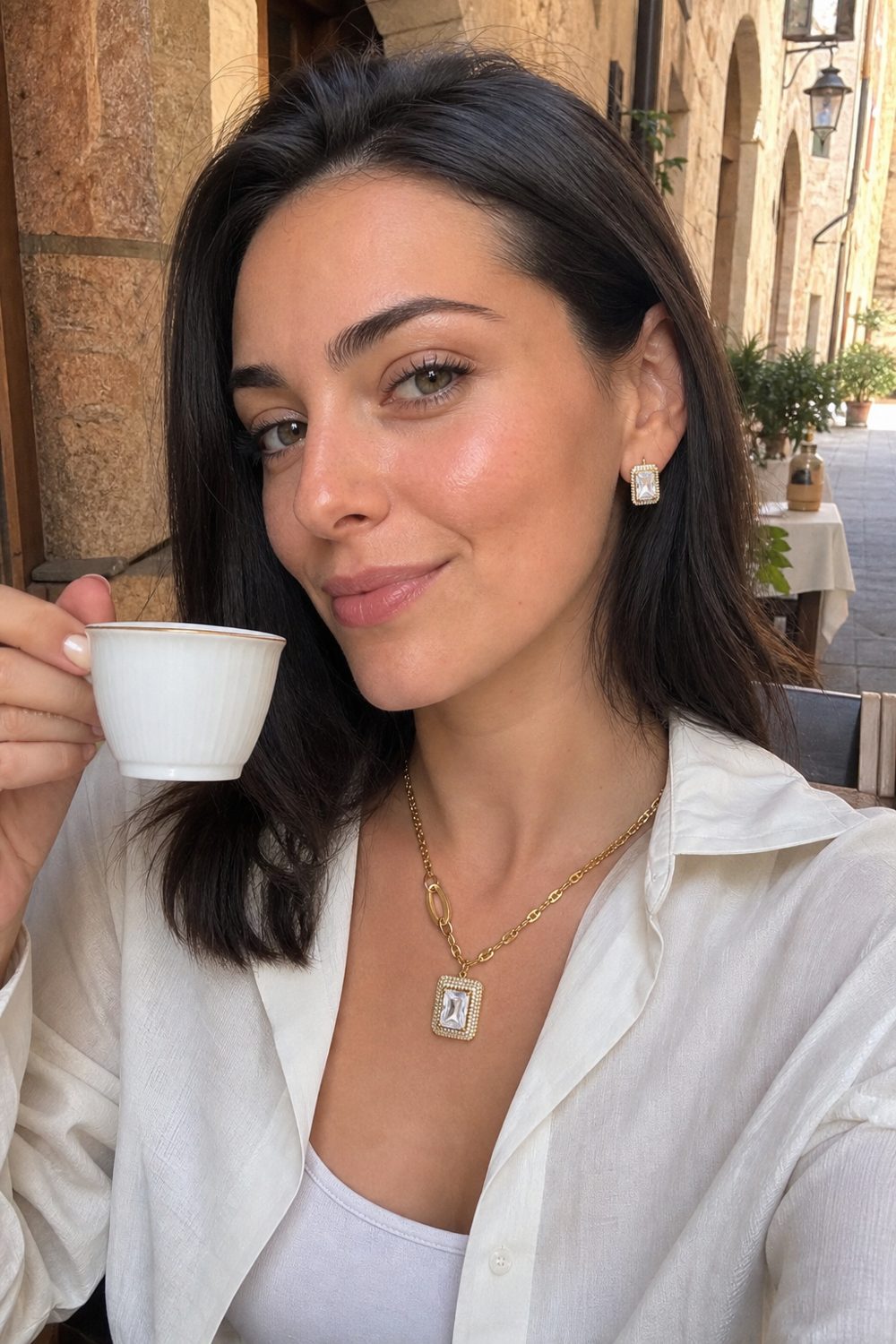 Customer wearing Emerald Cut Halo Set