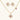 Gold-plated quatrefoil necklace and earring set with white enamel, pink cubic zirconia centers, and crystal borders