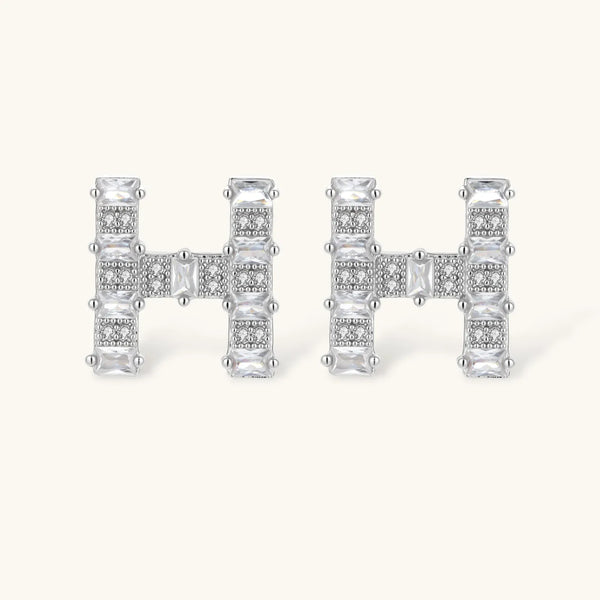 Letter H jewelry set featuring geometric crystal design in gold and white gold plated finish with adjustable chain necklace