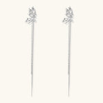 Silver-toned threader earrings featuring detailed fairy figure with wings and dual delicate chain strands, zirconia accents