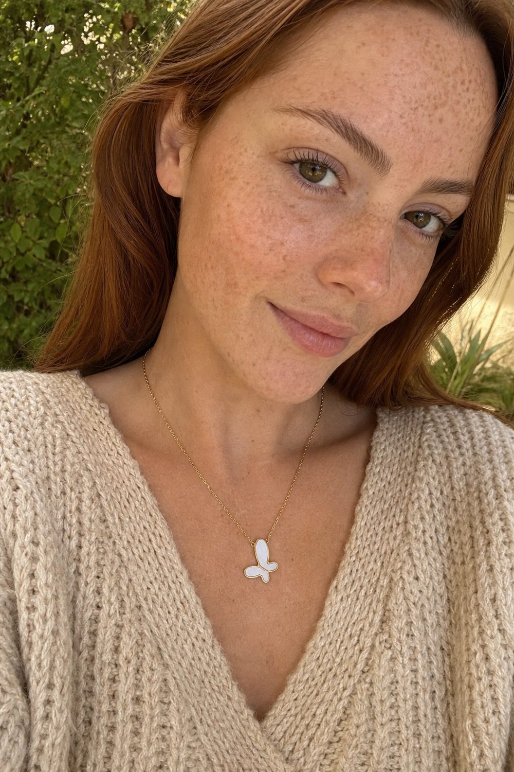 Customer wearing Flutter Dream Necklace