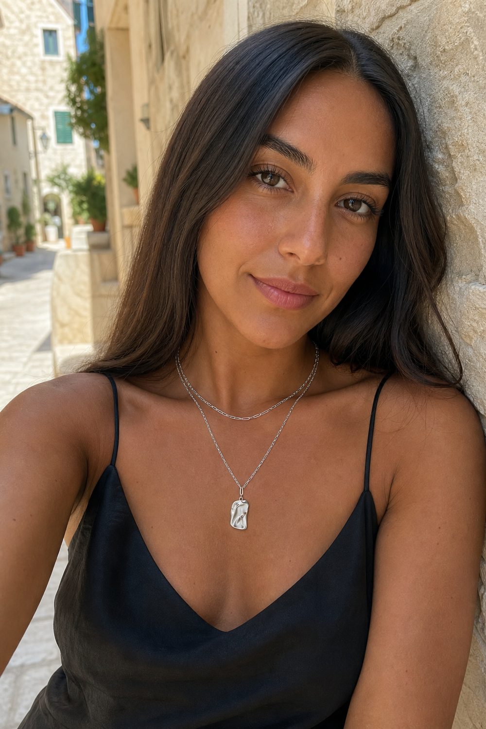 Customer wearing Fluid Dreams Layered Necklace